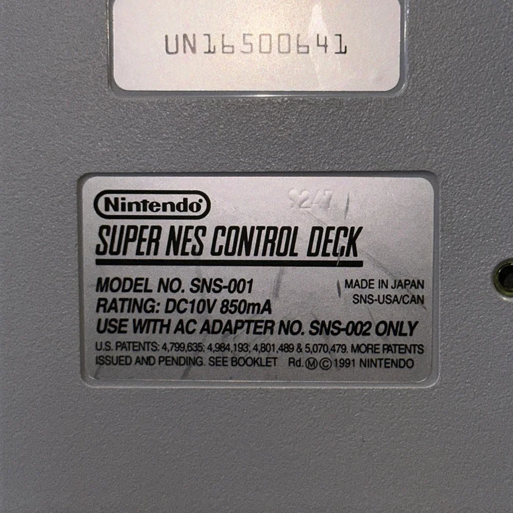 Super Nintendo Entertainment system 1991 with 2 controllers and mouse